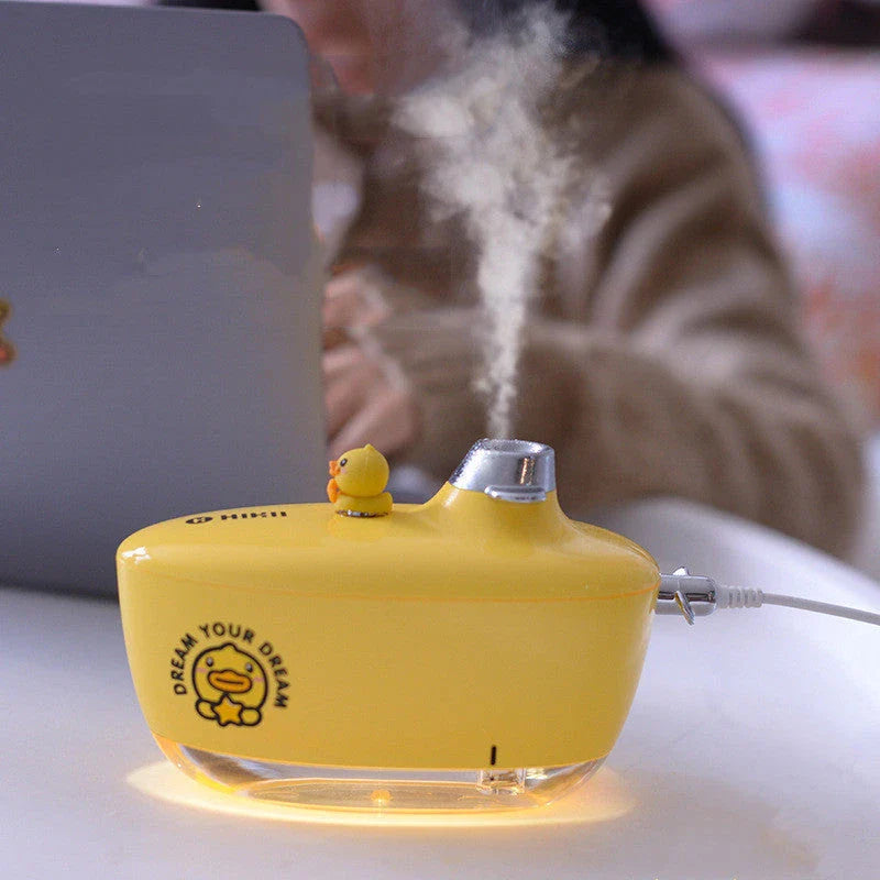 Compact, USB-powered portable air humidifier with discreet night light and silent operation for improved air quality and comfort
