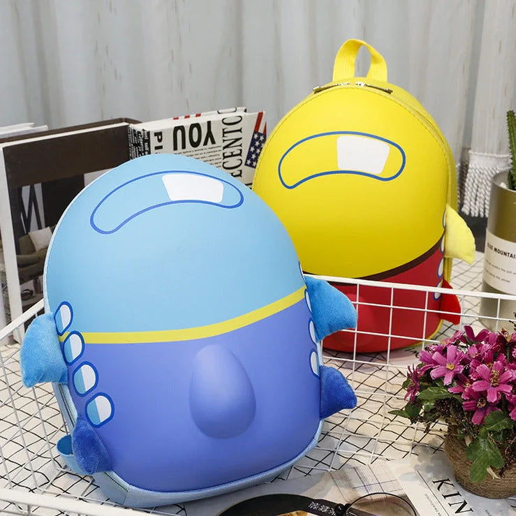 Blue aircraft-shaped children's hard shell backpack with cartoon graphics and adjustable shoulder straps