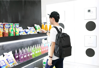 Black men's PU leather backpack with computer pocket and adjustable shoulder straps