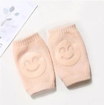 Cozy knee pads in various colors designed to protect babies during crawling with a non-slip, stretchy fit