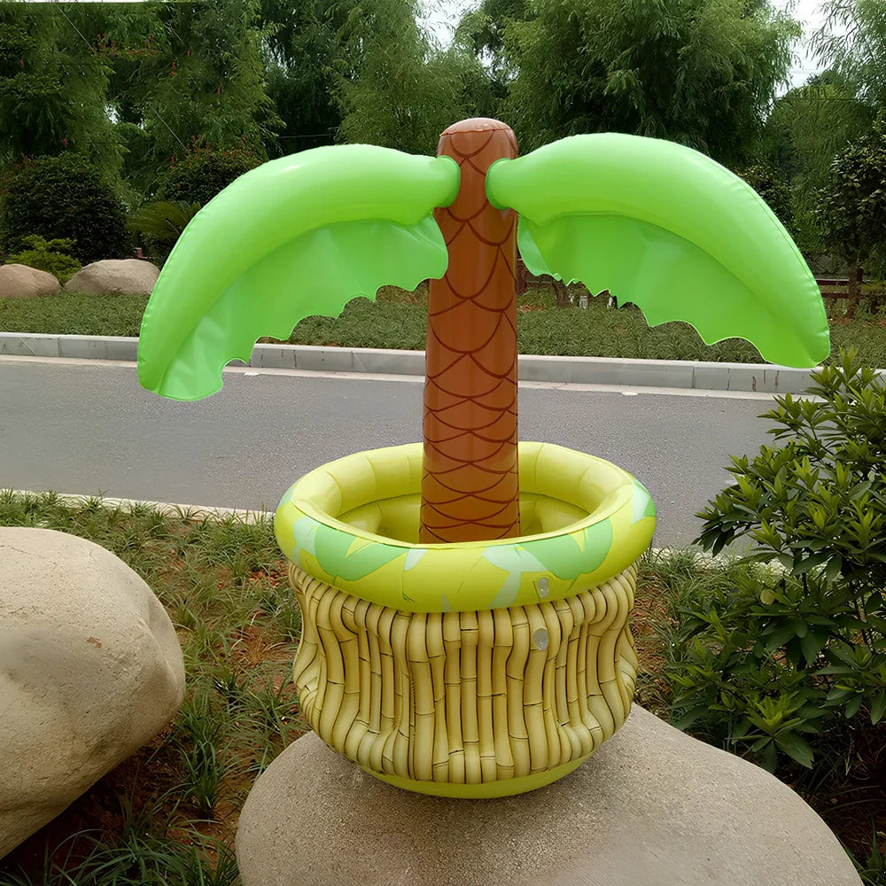 Green inflatable palm tree shaped cooler with coconut details holding beer bottles and ice