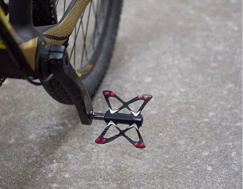 Bicycle Palin Foot Pedal PD-M56 in carbon black, titanium silver, and bright gold