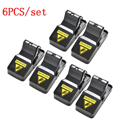 Six black plastic snapping mousetraps showing quick-kill mechanism and compact 11cm size