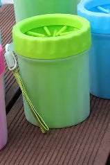 Blue silicone and PP portable dog foot wash barrel for cleaning pet paws.