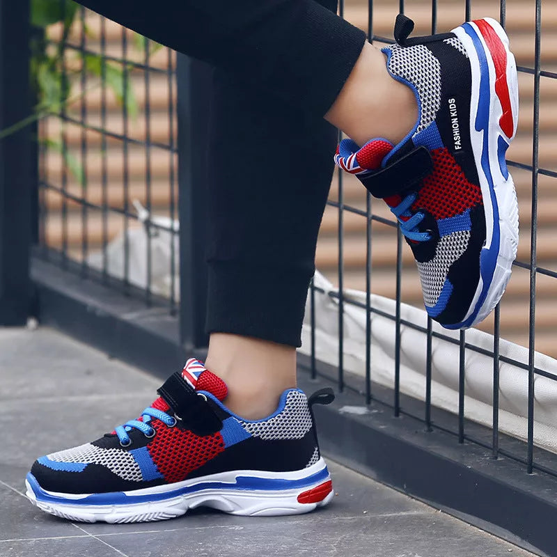 Kids' breathable mesh running shoes in pink, grey orange, and royal blue grey