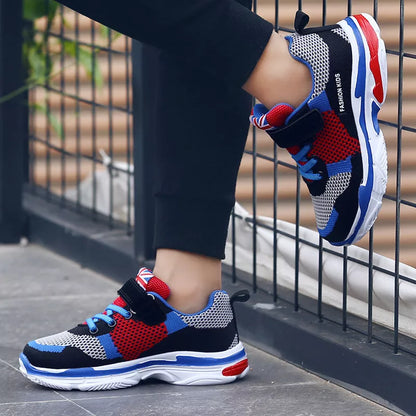 Kids' breathable mesh running shoes in pink, grey orange, and royal blue grey