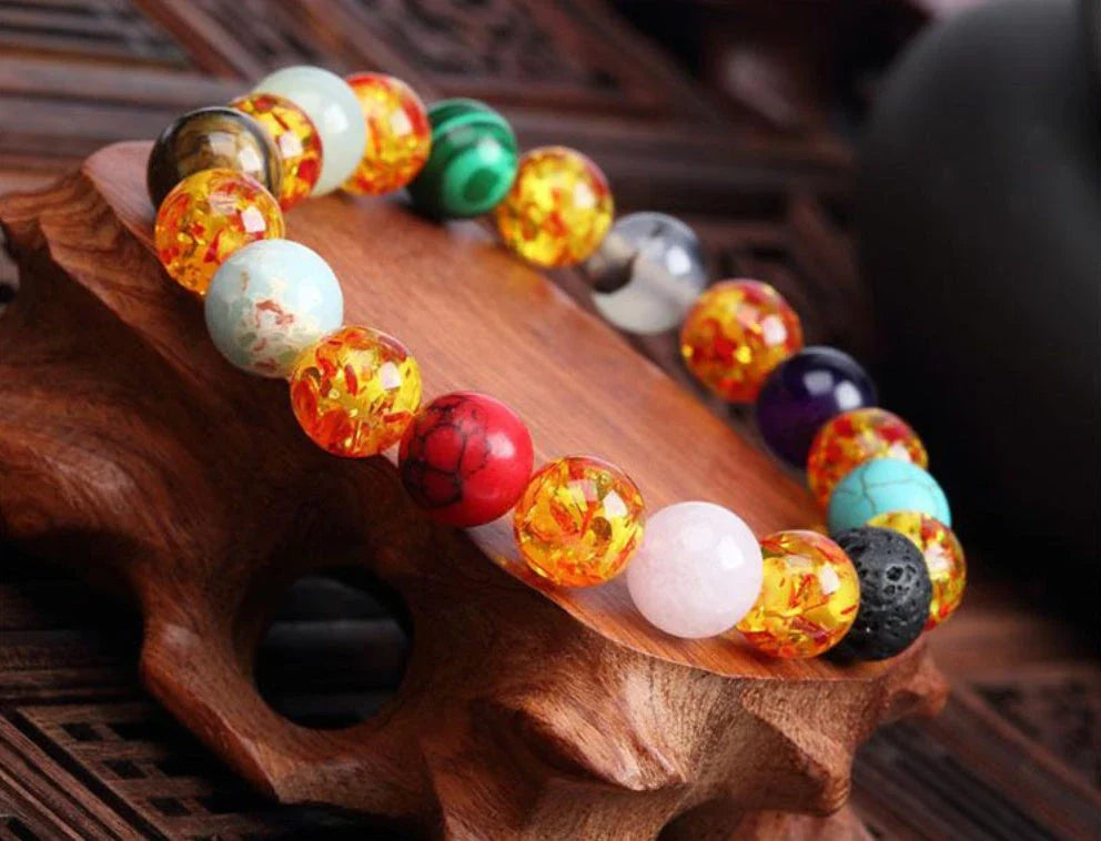 Handcrafted black lava beaded bracelet with seven chakra stones for healing and balance