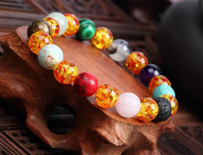 Handcrafted black lava beaded bracelet with seven chakra stones for healing and balance