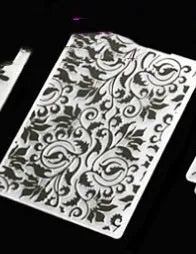 Set of ten plastic cake decorative moulds showing windmill, star, flower, and butterfly patterns.