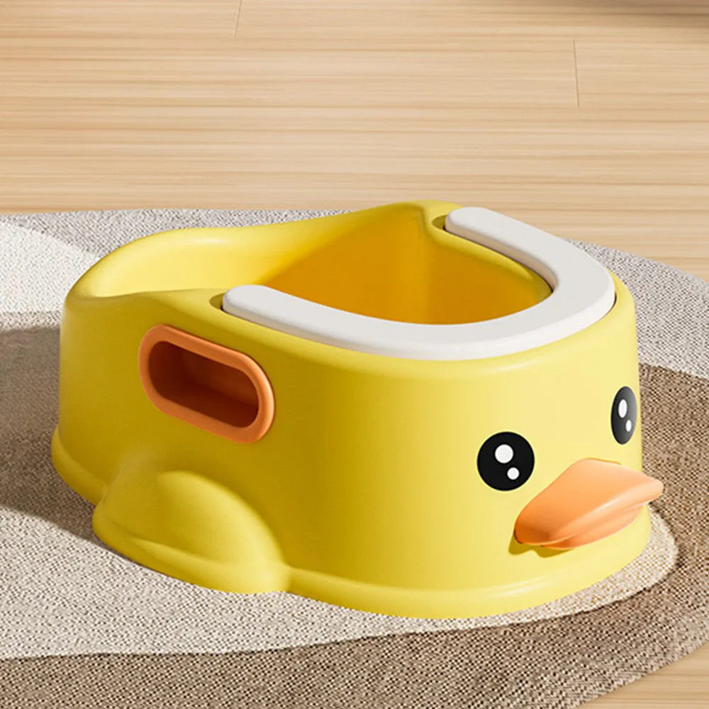 Blue PVC duck-shaped bathtub for washing a small dog or cat outdoors.