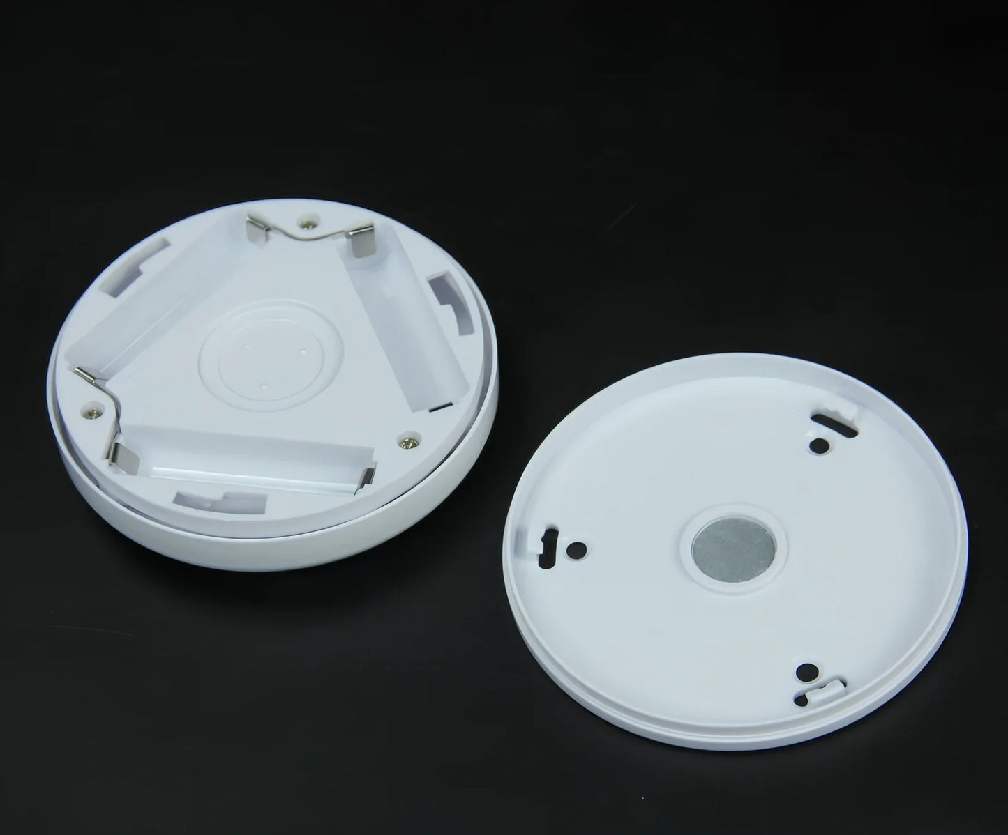 White motion-sensing LED cabinet lamp with magnetic back for wireless installation