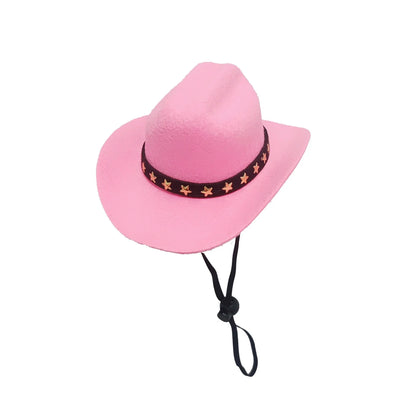 A black pet cowboy hat with a white star on the front, shown with its adjustable elastic strap.