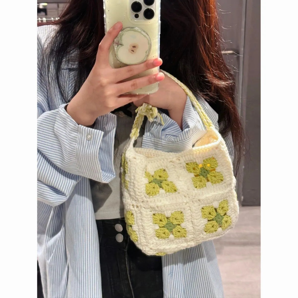 Handmade cotton crochet handbag with cherry blossom pattern and magnetic buckle closure