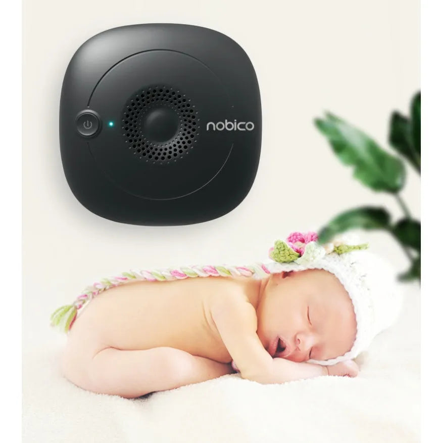 Black and wood grain ultrasonic bed vacuum cleaner for mite control on a mattress