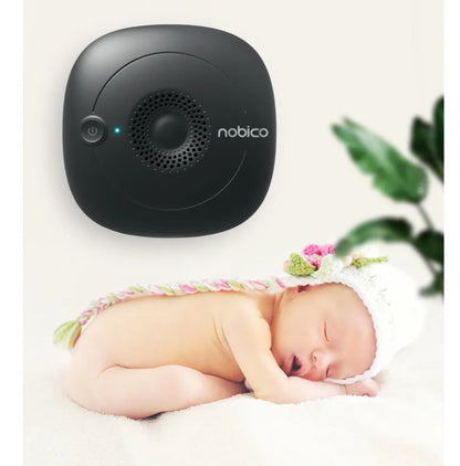 Black and wood grain ultrasonic bed vacuum cleaner for mite control on a mattress