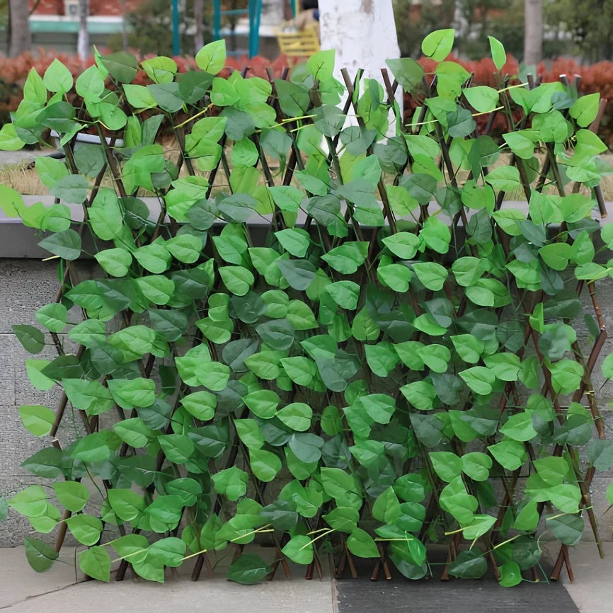 Plastic simulation wooden fence panel showing realistic wood grain texture in outdoor setting