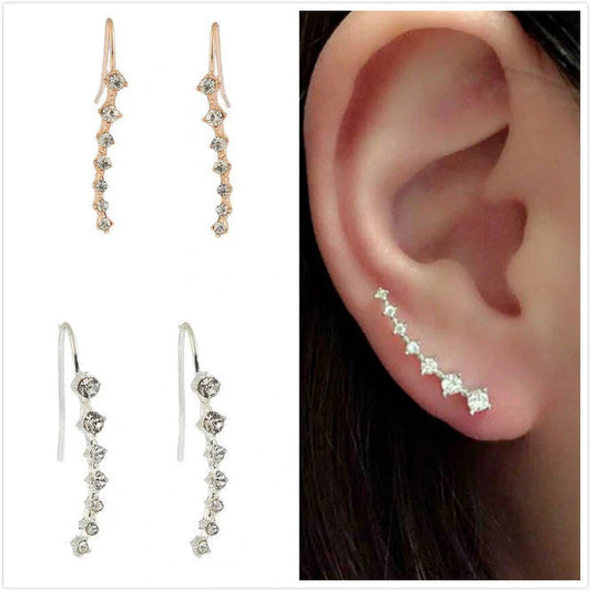 Elegant 7-inch rhinestone bridal earrings sparkling on a white background