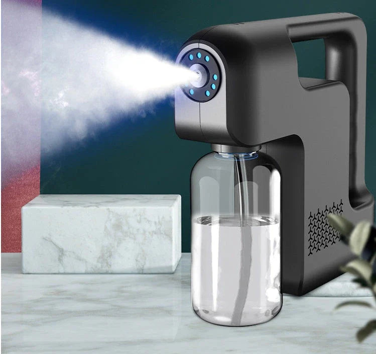 Portable USB-powered disinfection sprayer with wireless charging, featuring atomization technology, long battery life, and multi-functional capabilities