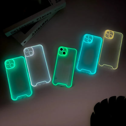Glow-in-the-dark soft TPU iPhone case in green, orange, blue, yellow, or pink on an iPhone