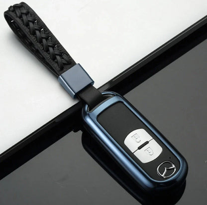 Aluminum alloy key case for Mazda with CNC engraving, available in sapphire, blue, grey, and rose gold