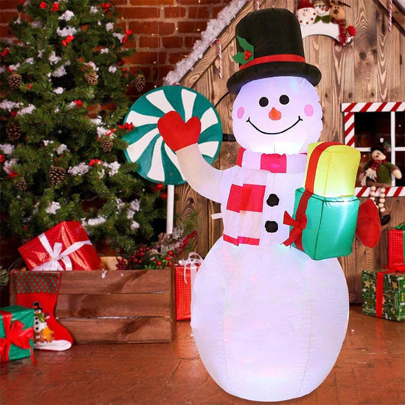 Glow-in-the-dark Christmas inflatable decorations featuring a Santa, snowman, and Christmas tree