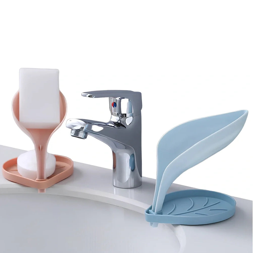 Blue bathroom soap dish with tree texture pattern and drainage channels on white ceramic sink