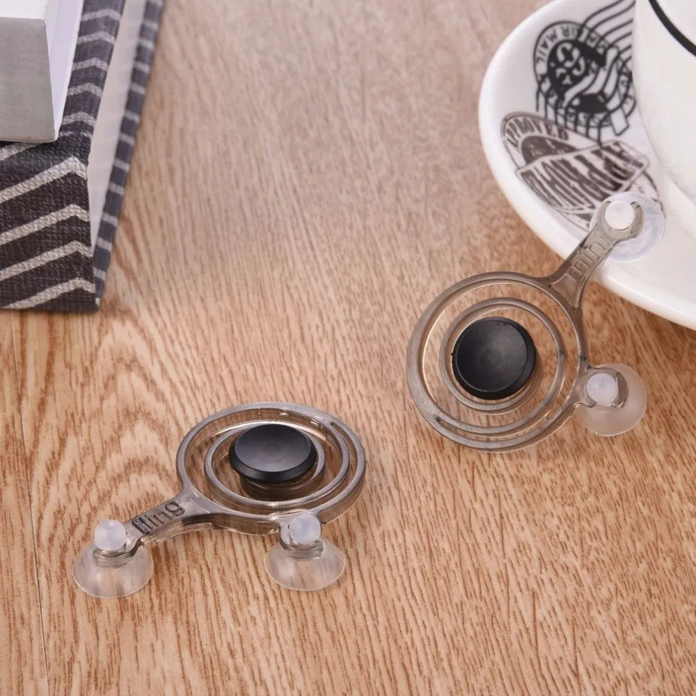 Universal mini joystick pair for mobile phones with 63x48x12mm dimensions and clear/black colour option