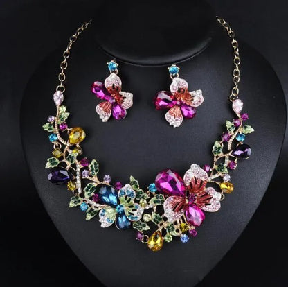 Crystal chain hair clip with gold-tone metal, crystal detailing, and exaggerated chain design for parties and weddings.