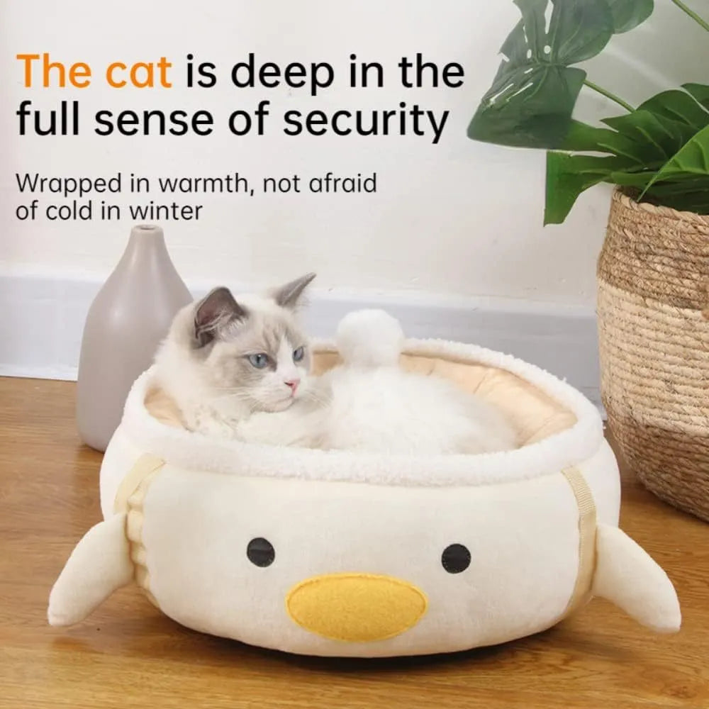 Green chick-shaped cat bed laid flat with hanging straps attached, suitable for small cats