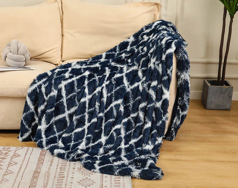Soft, plush sherpa throw blanket in a variety of colors and sizes, perfect for cozy relaxation on the sofa or bed