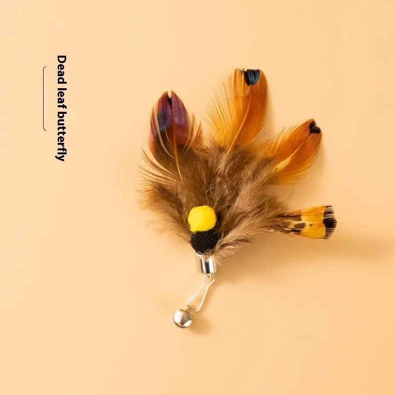 Three steel wire cat toy replacement heads with small flying insect designs in varied colours