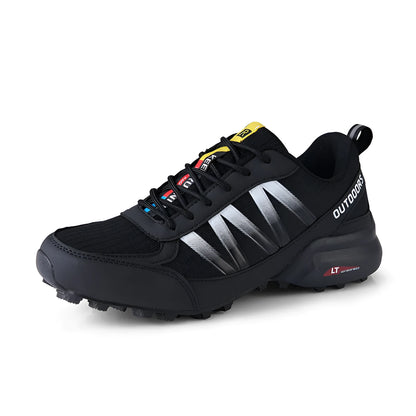 Men's mountaineering and rock climbing sneakers with rubber sole and lace-up front in black colour.