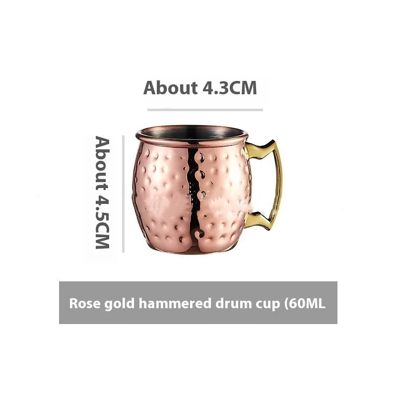 Stainless steel Moscow Mule cup with copper interior in gold, rose gold, silver, or black finish.