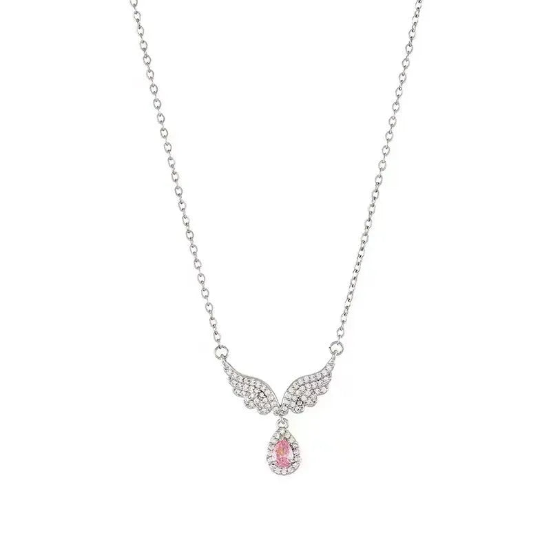 Women's sterling silver fishtail pendant necklace on adjustable O-ring chain, showing geometric design.