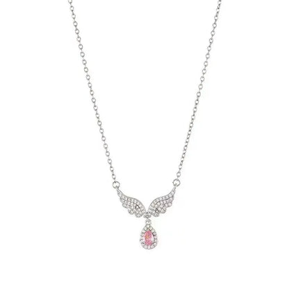 Women's sterling silver fishtail pendant necklace on adjustable O-ring chain, showing geometric design.