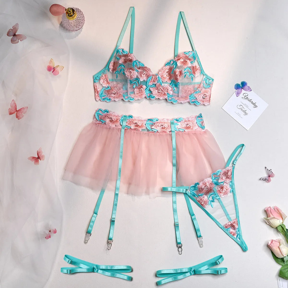 Pink mesh pettiskirt and bikini top set with embroidery detailing on lightweight polyester fabric