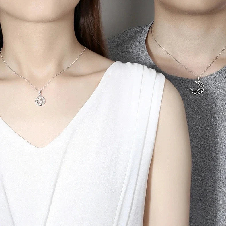 Sun Moon Tooth Couple Necklace showing electroplated copper pendants on 45cm cross chain