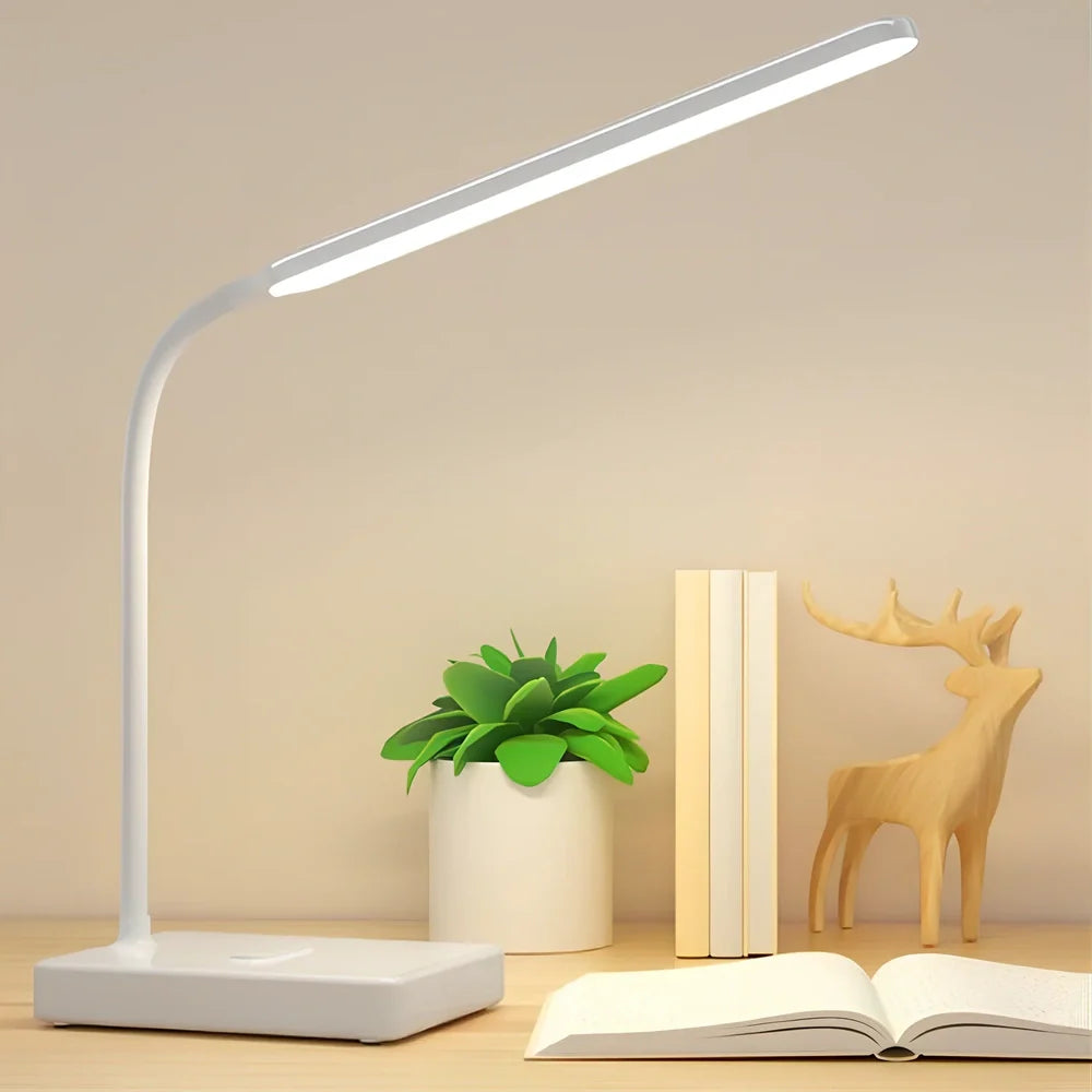 White LED desk lamp with adjustable arm and touch controls showing three colour temperature options