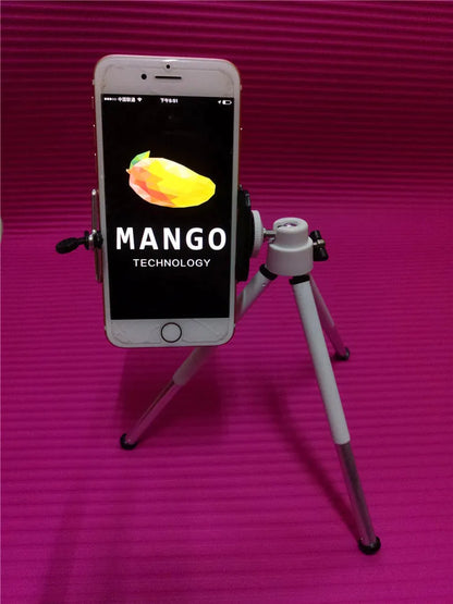 Silver adjustable desktop phone holder with two-section bracket on a wooden desk