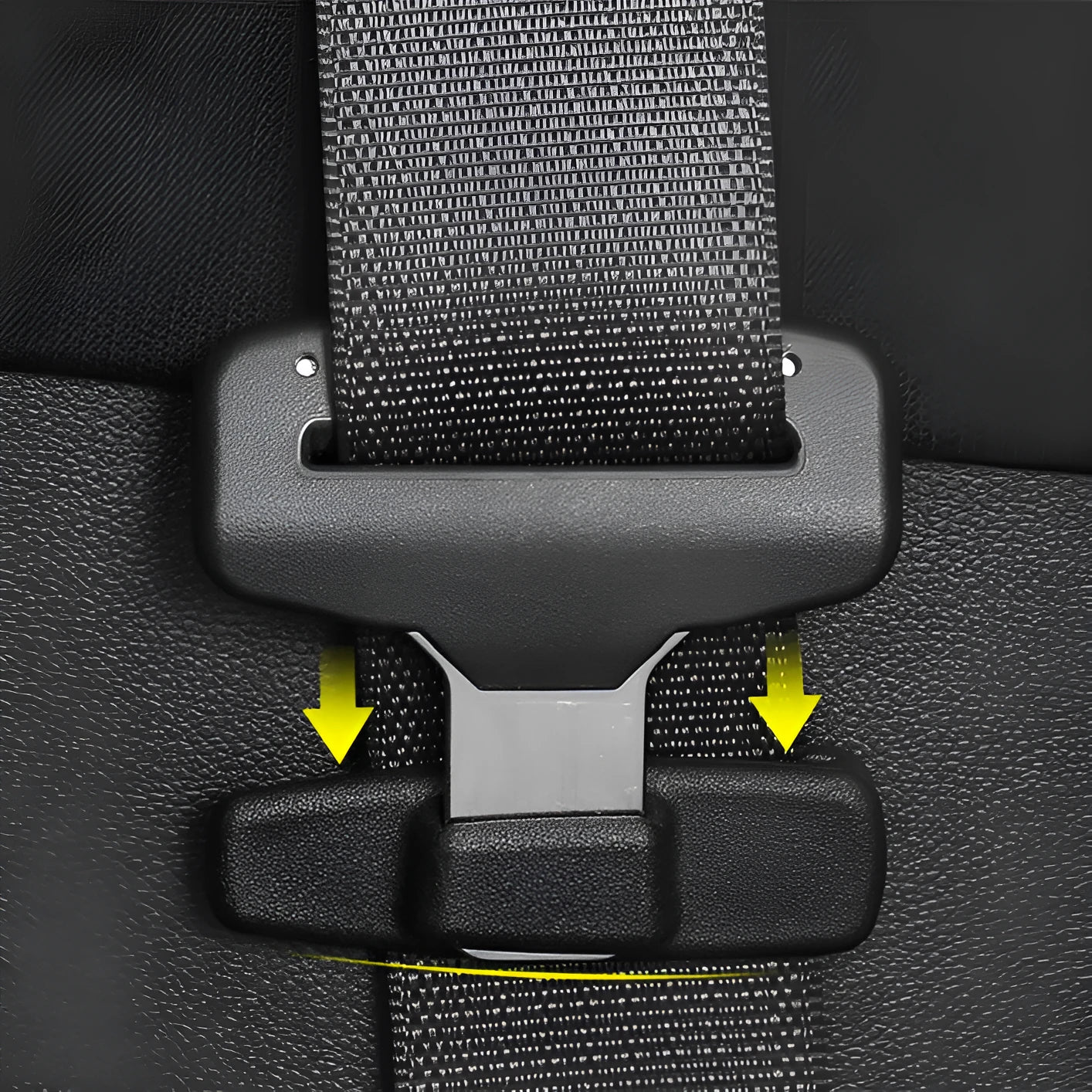 Two black ABS plastic car seat belt stopper clips on a clear OPP bag.