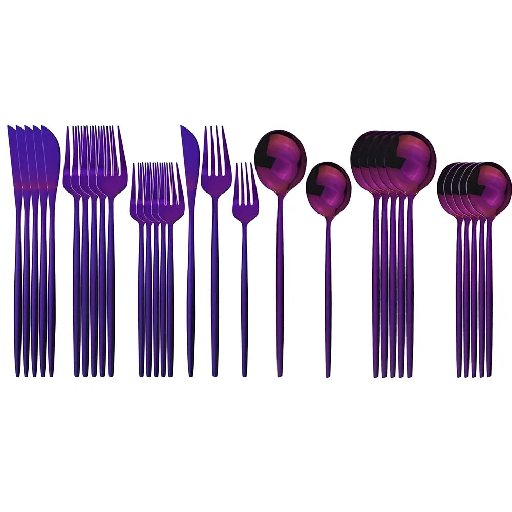 36-piece stainless steel cutlery set with mirror-polished table knives, forks, spoons, dessert forks, and dessert spoons arranged for six place settings