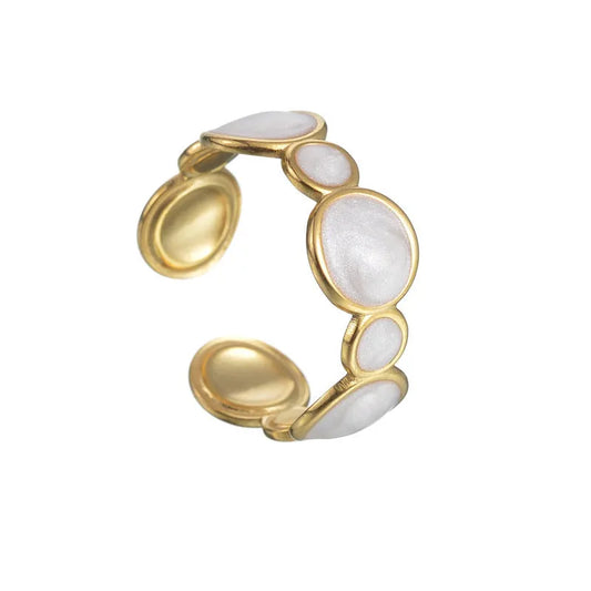 Adjustable geometric stainless steel ring with electroplated finish showing angular design and opening mechanism