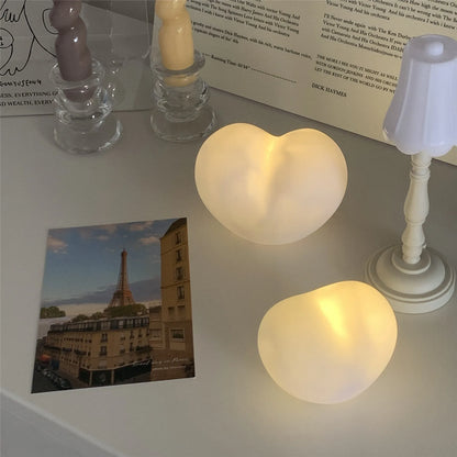 Vinyl atmosphere lamp in small or large size with warm glow, powered by batteries, available in white or pink colours
