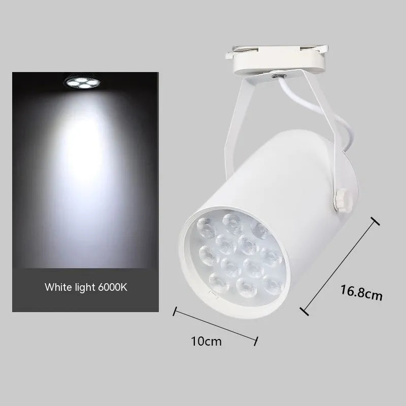 LED track spotlight with aluminium shell in black or white finish, mounted on a lighting track.