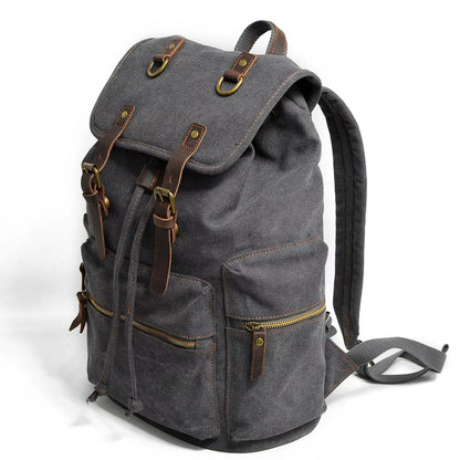 Men's casual canvas backpack with leather accents, dimensions 28x15x43cm