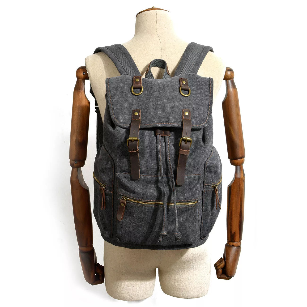 Men's casual canvas backpack with leather accents, dimensions 28x15x43cm