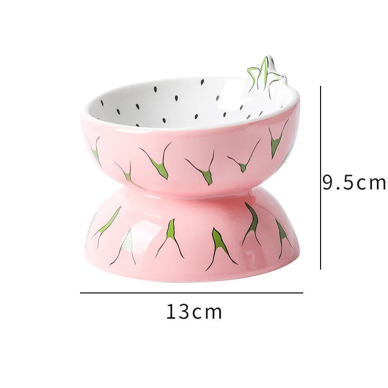 Ceramic raised cat bowl with tilted design in fruit pattern colours