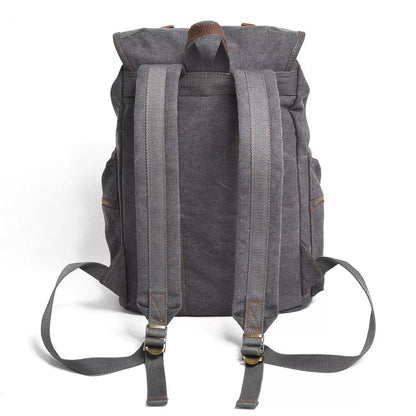 Men's casual canvas backpack with leather accents, dimensions 28x15x43cm