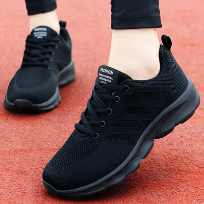 Women's white mesh fabric lace-up leisure shoes with a low heel on a plain background.