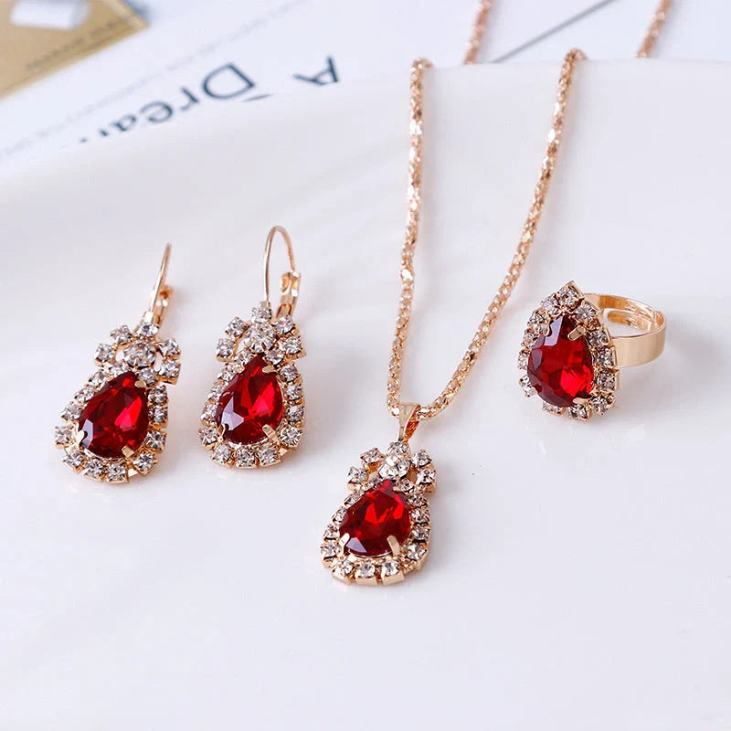 Elegant water drop rhinestone necklace, earrings, and ring set in various colors